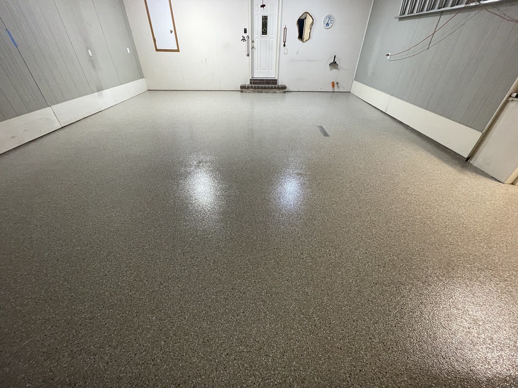 Applying the base coat and broadcasting decorative flakes