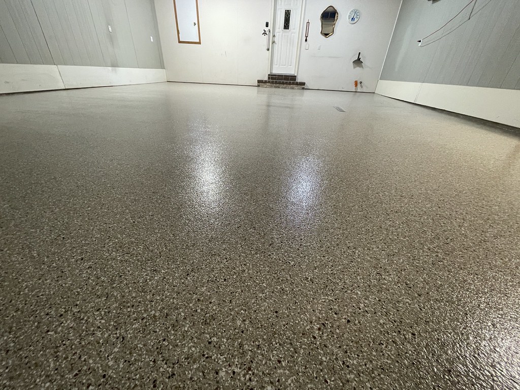 Wide view of the finished Creekbed polyaspartic garage floor in Morton