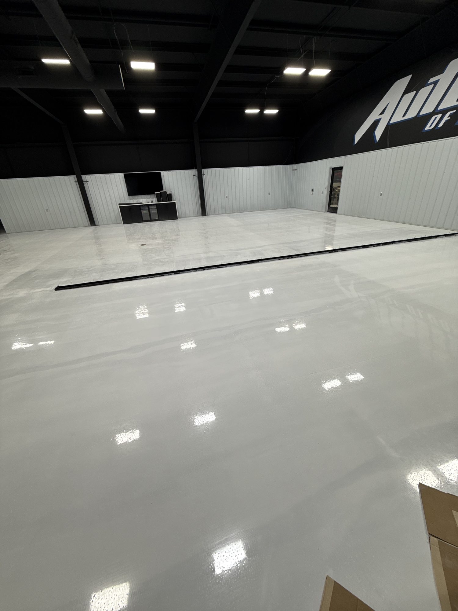 AutoHouse of Bloomington Metallic Epoxy Showroom Floor - Photo 5