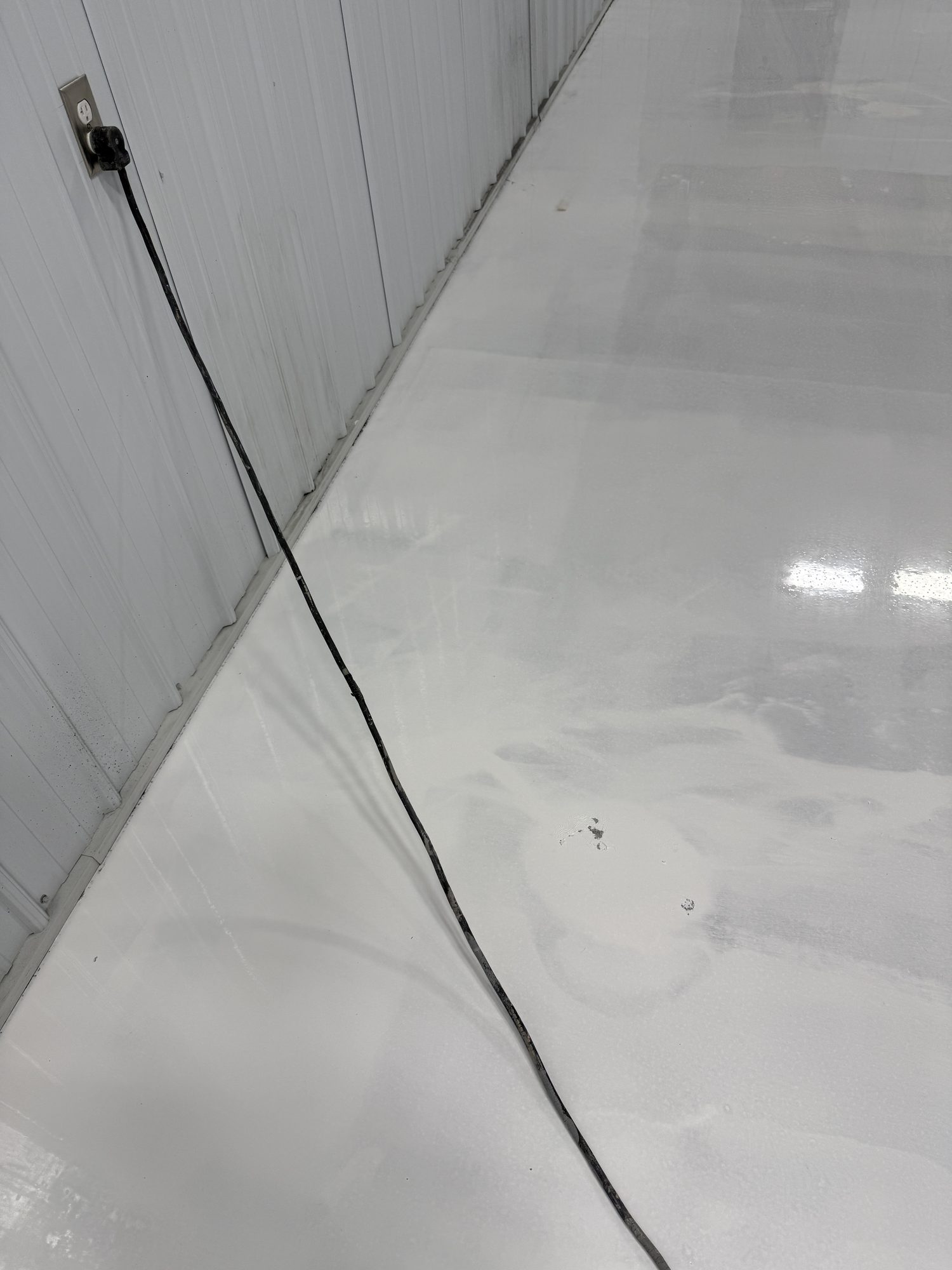 AutoHouse of Bloomington Metallic Epoxy Showroom Floor - Photo 6
