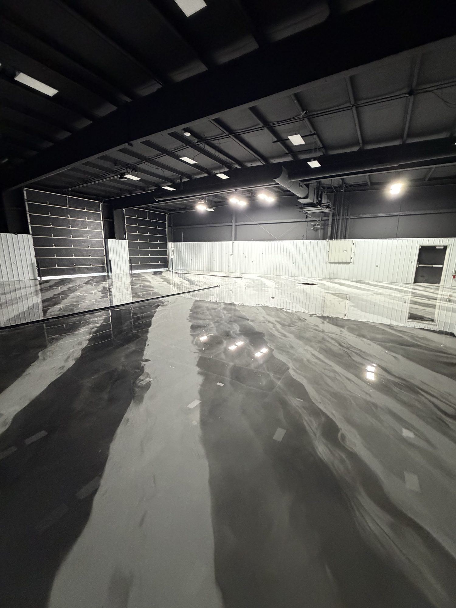 AutoHouse of Bloomington Metallic Epoxy Showroom Floor - Photo 8