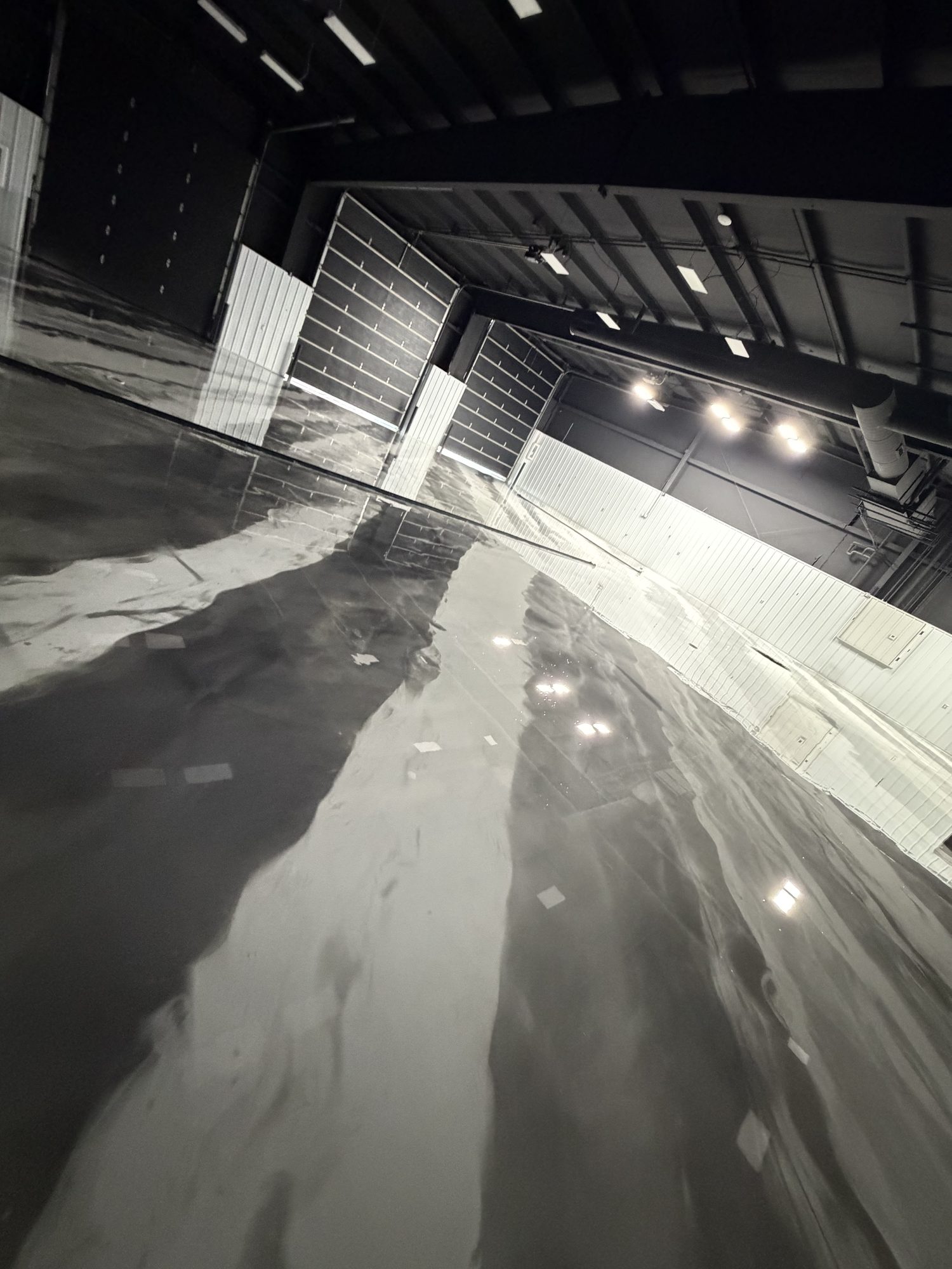 AutoHouse of Bloomington Metallic Epoxy Showroom Floor - Photo 9