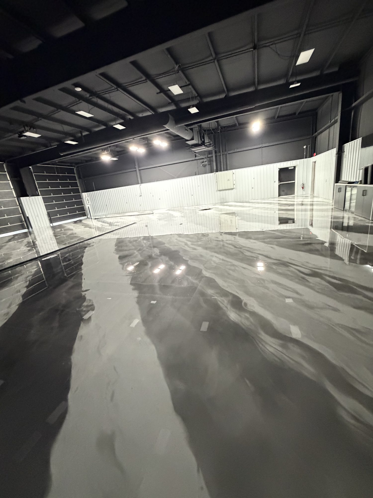 AutoHouse of Bloomington Metallic Epoxy Showroom Floor - Photo 10
