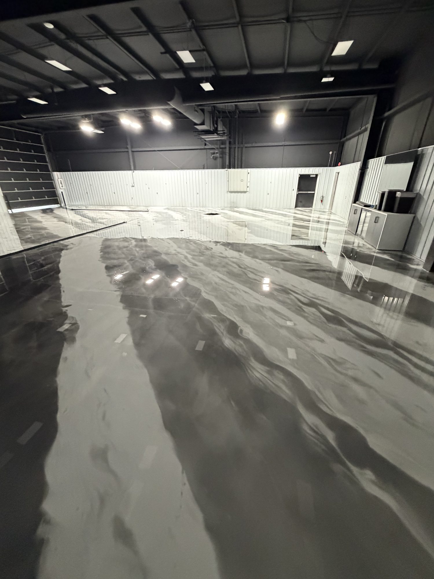 AutoHouse of Bloomington Metallic Epoxy Showroom Floor - Photo 11