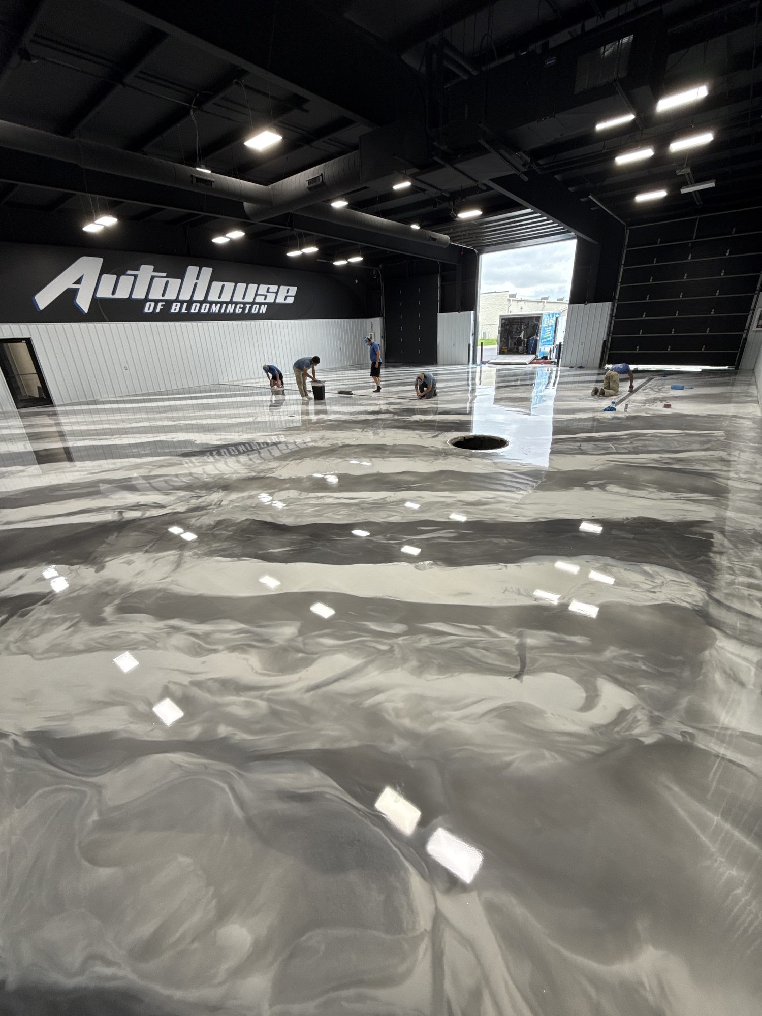 AutoHouse of Bloomington Metallic Epoxy Showroom Floor - Photo 12
