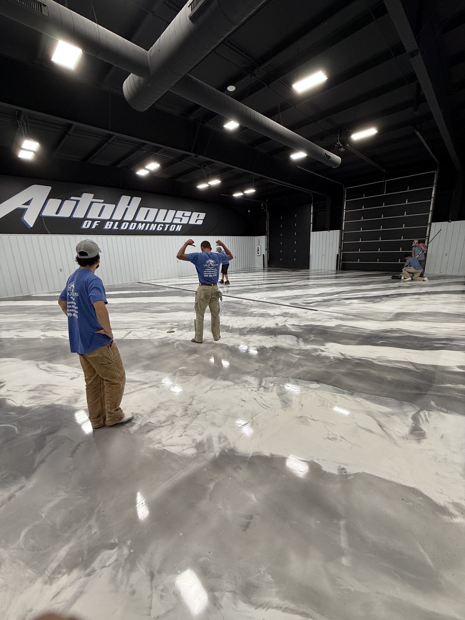 AutoHouse of Bloomington Metallic Epoxy Showroom Floor - Photo 13