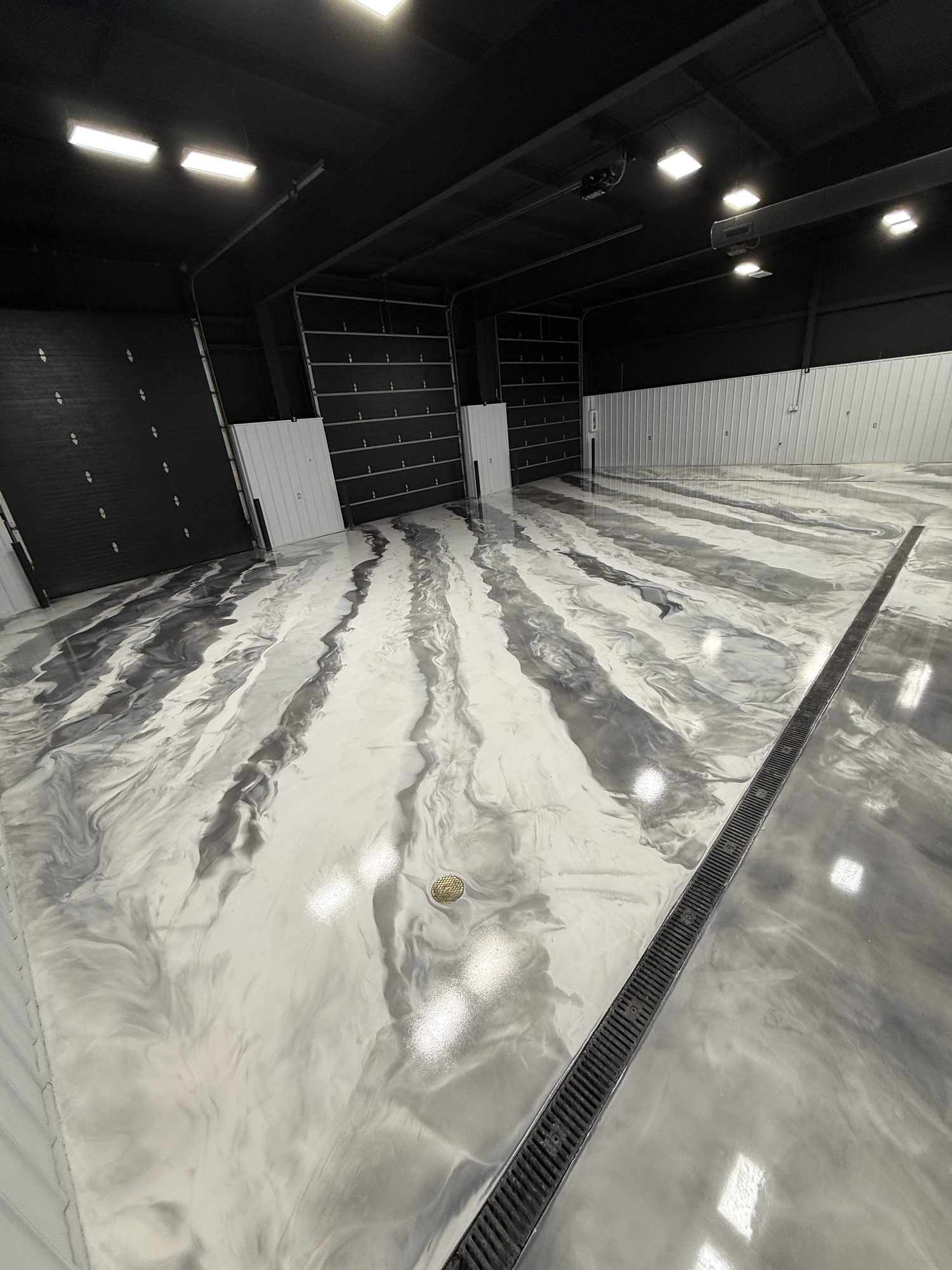 AutoHouse of Bloomington Metallic Epoxy Showroom Floor - Photo 15