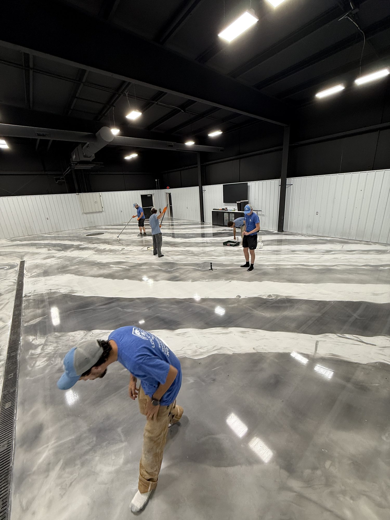 AutoHouse of Bloomington Metallic Epoxy Showroom Floor - Photo 16