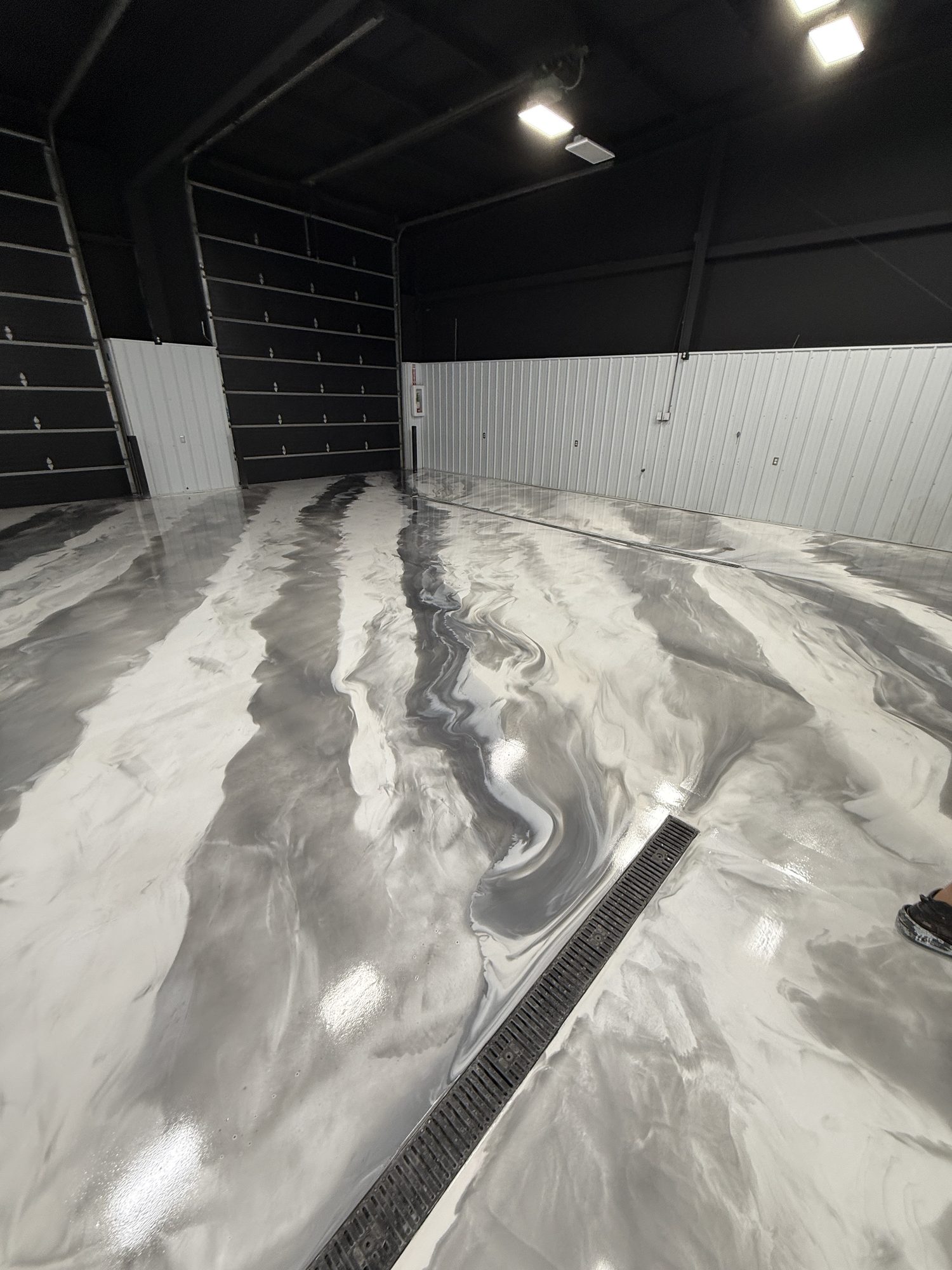 AutoHouse of Bloomington Metallic Epoxy Showroom Floor - Photo 17