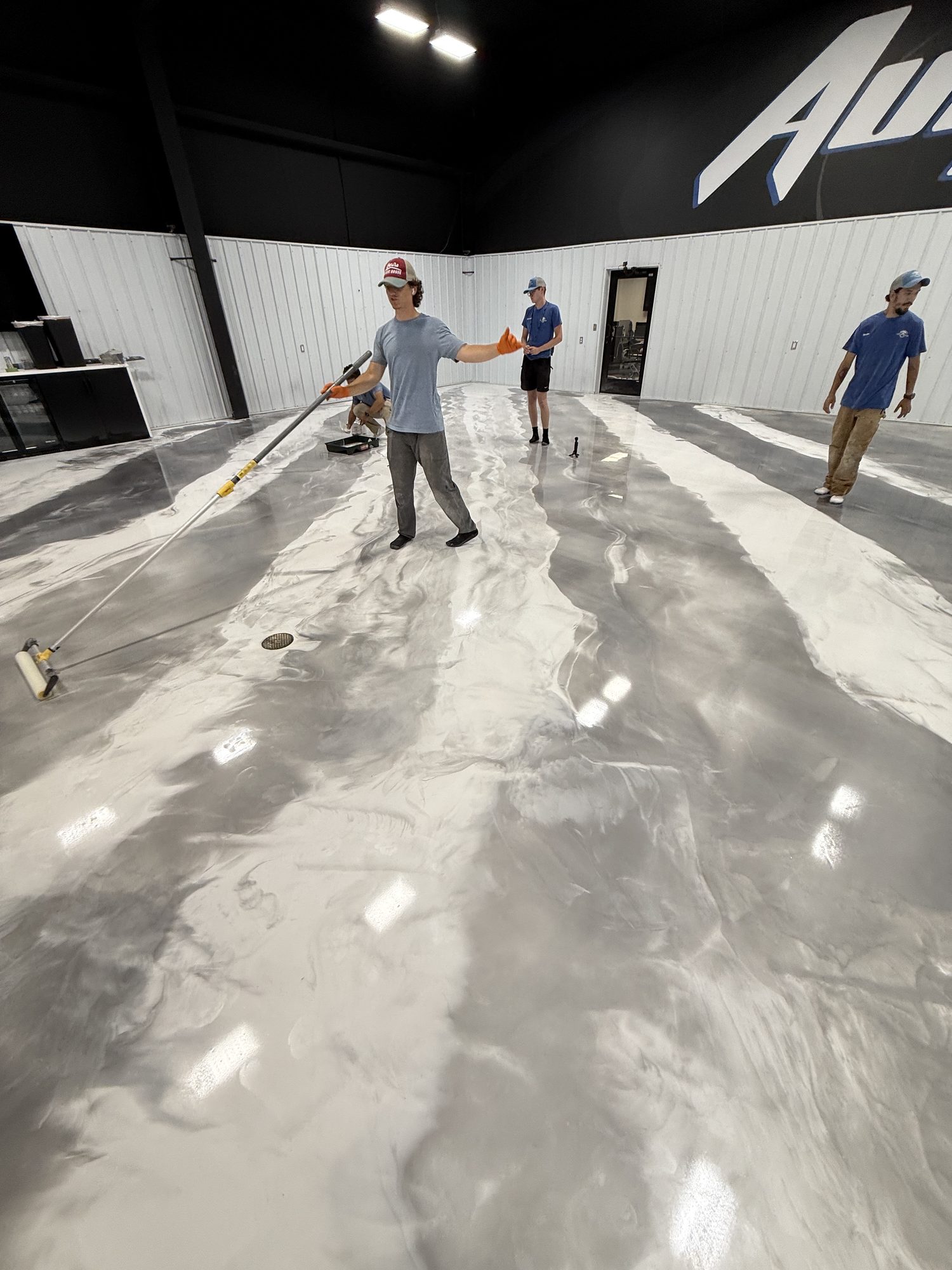 AutoHouse of Bloomington Metallic Epoxy Showroom Floor - Photo 19