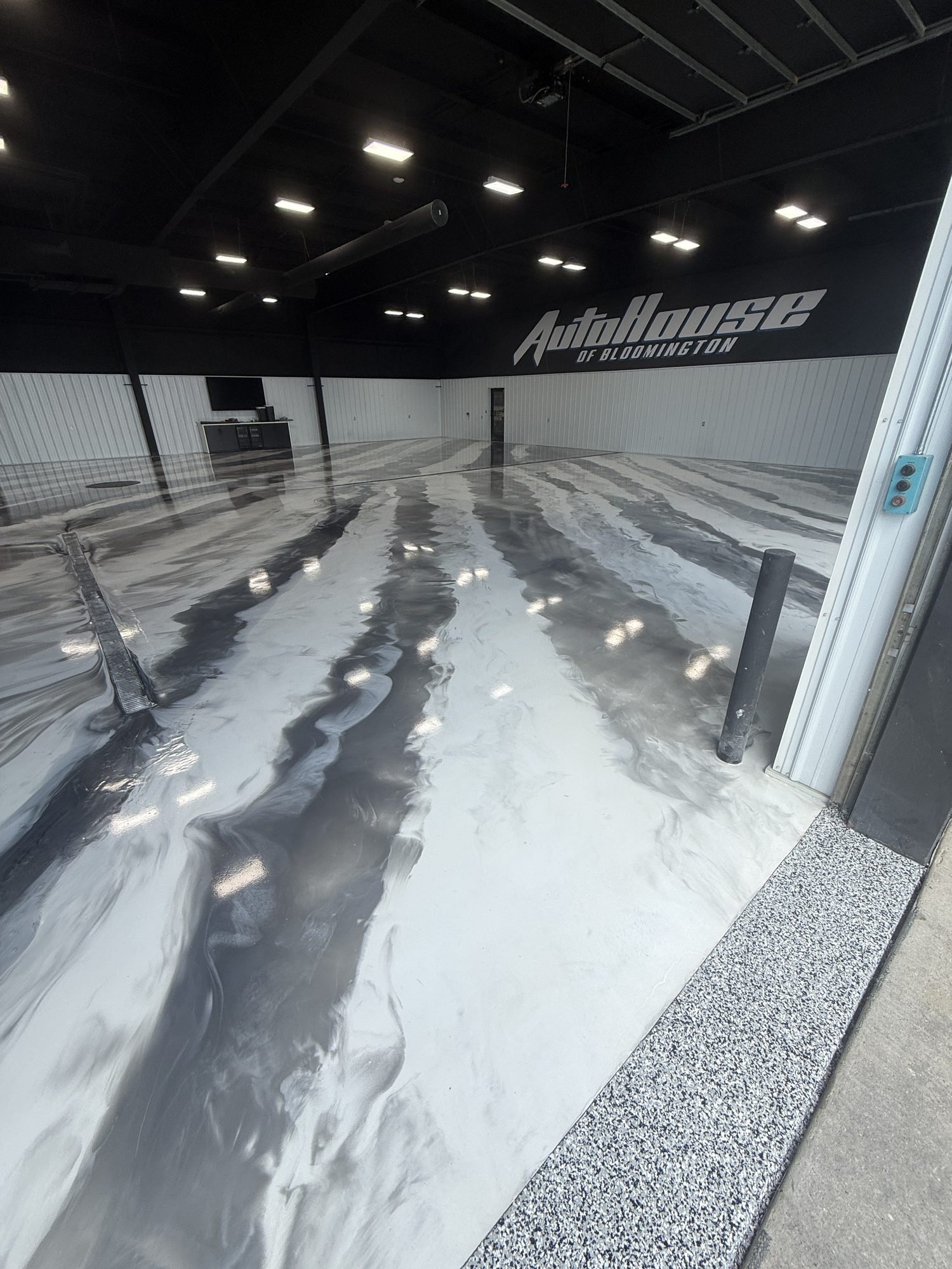 AutoHouse of Bloomington Metallic Epoxy Showroom Floor - Photo 22