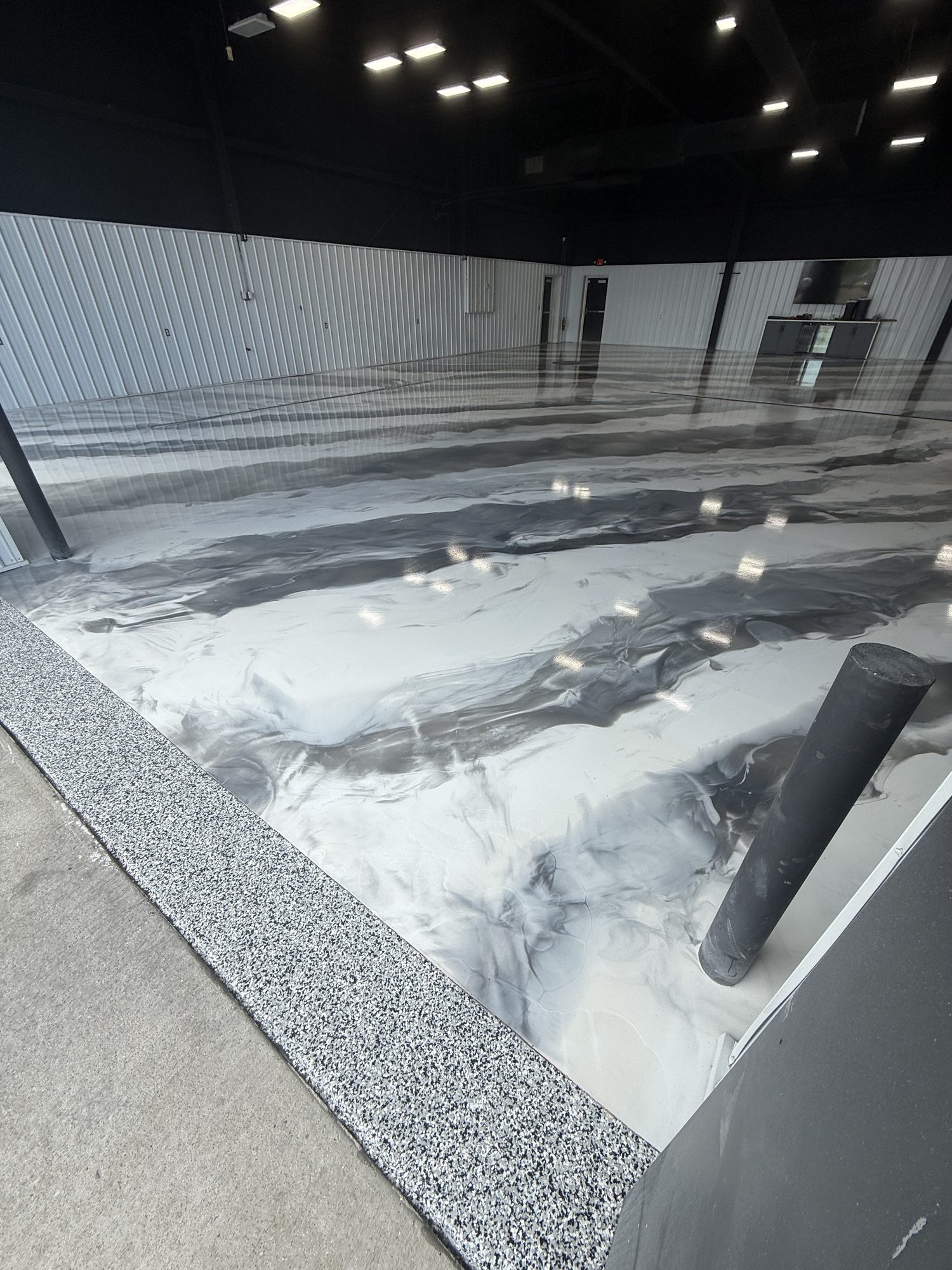 AutoHouse of Bloomington Metallic Epoxy Showroom Floor - Photo 24