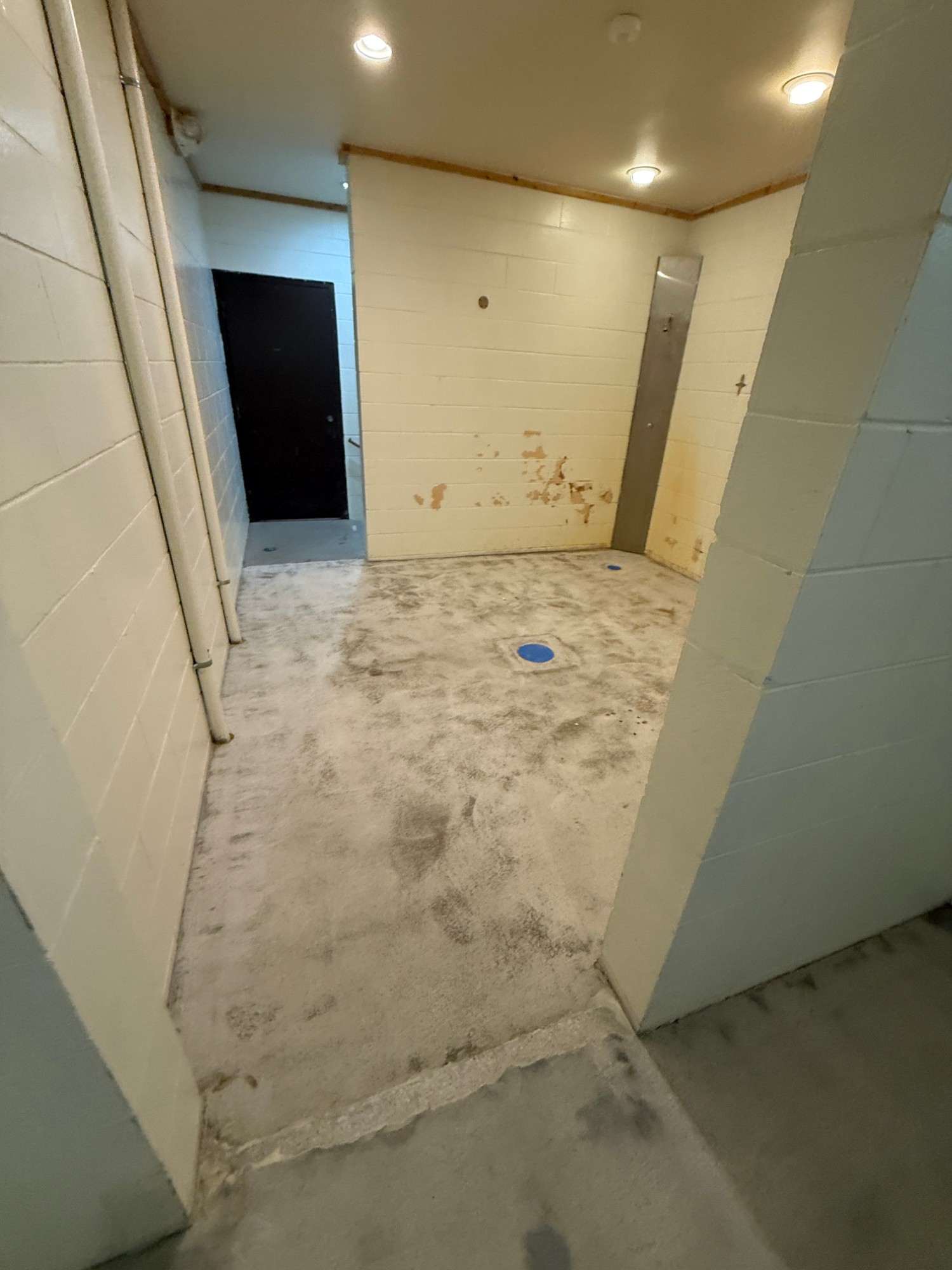 Comlara Park Beach House & Campground Shower Floor Coatings - Before