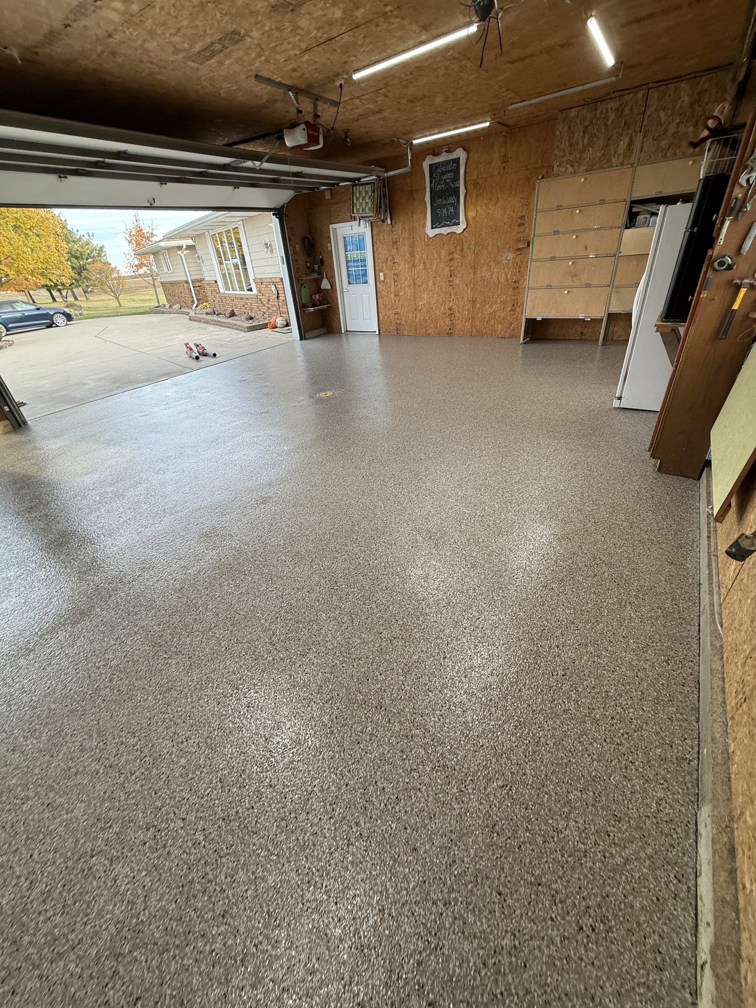 Creekbed 3-Car Garage Floor Coating - Before
