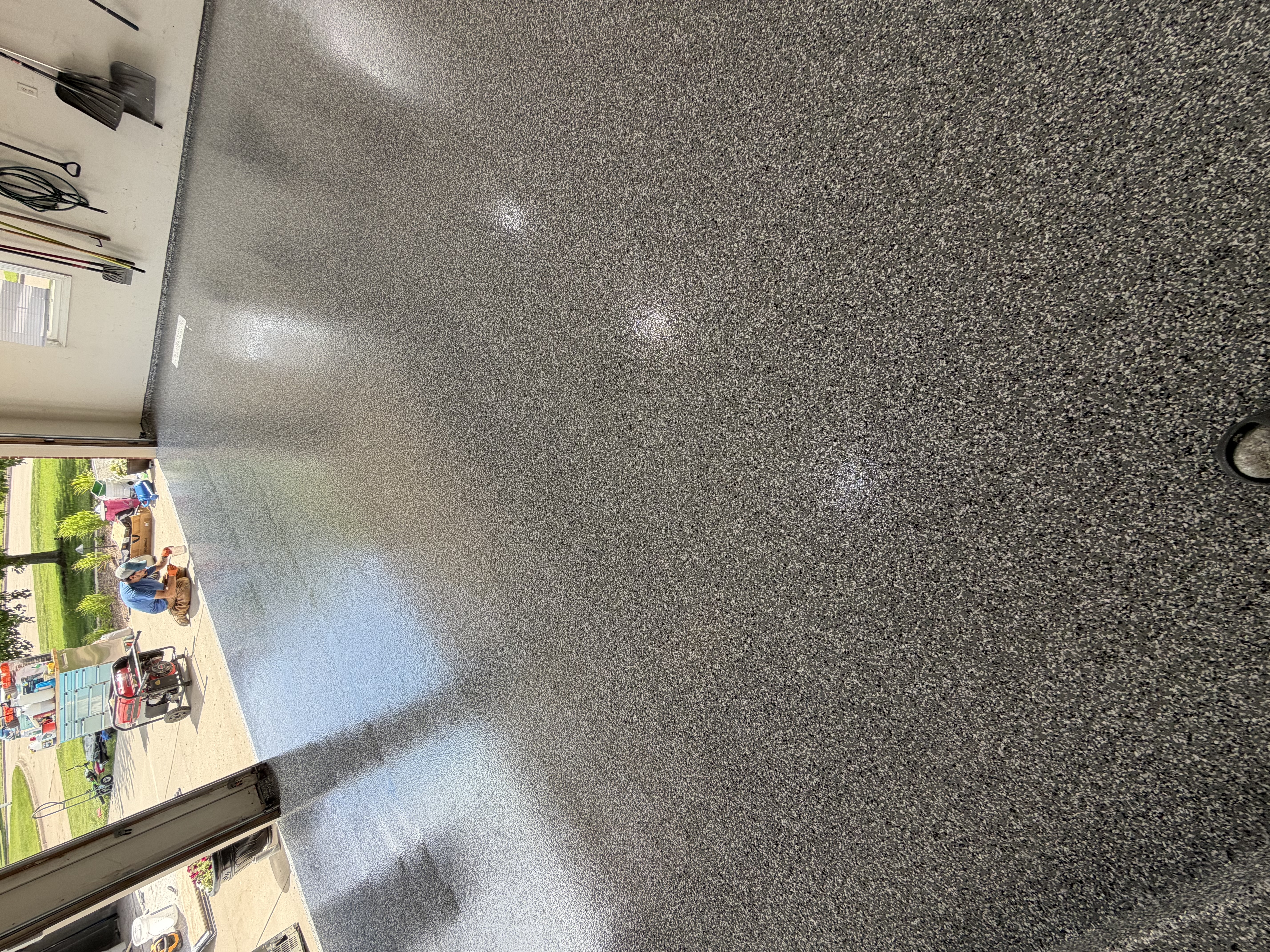The stunning final result of Jeremy's Wombat polyaspartic garage floor coating in Bloomington.