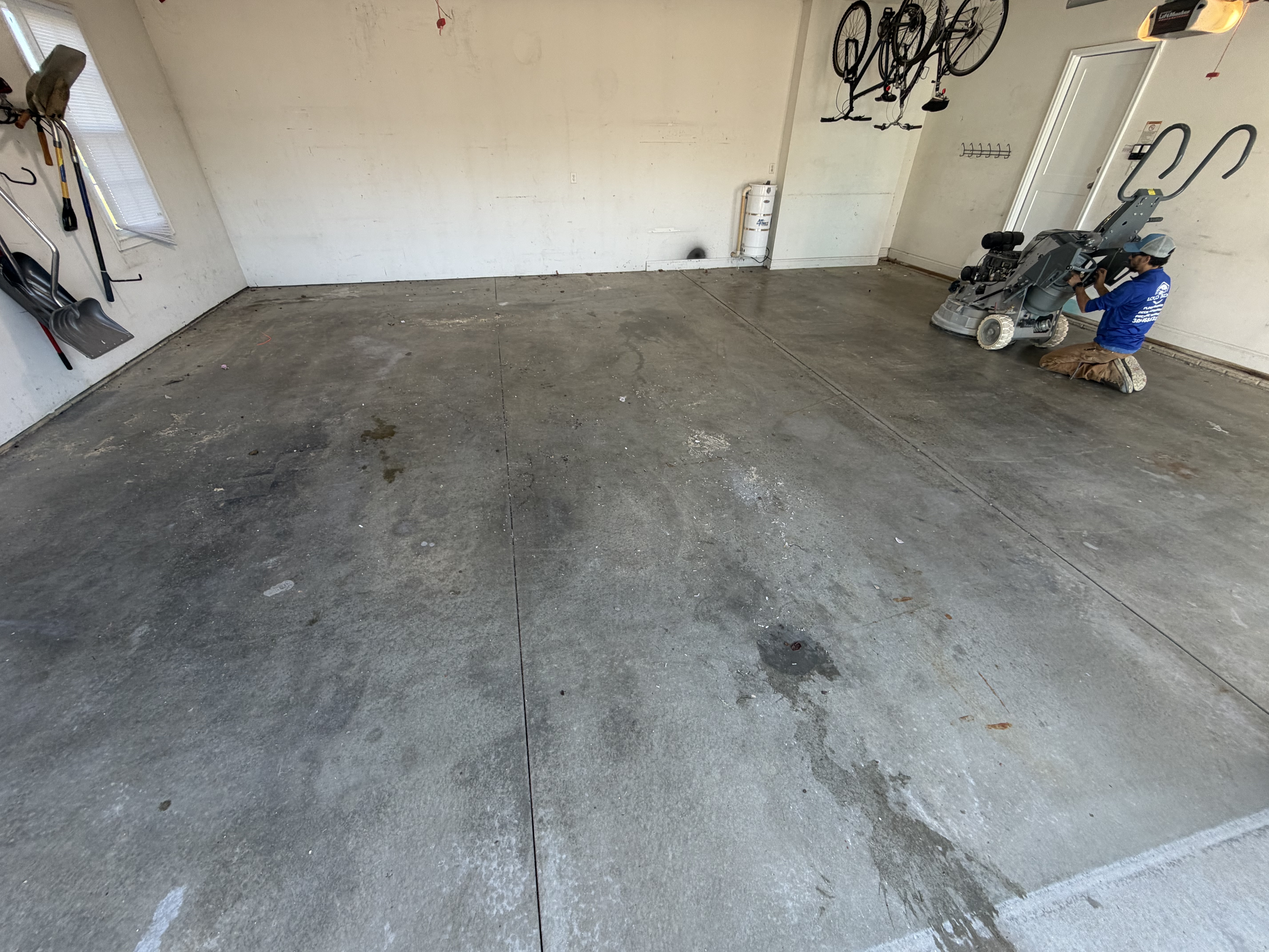 A closer look at the pre-inspection reveals the wear and tear on Jeremy's concrete floor.