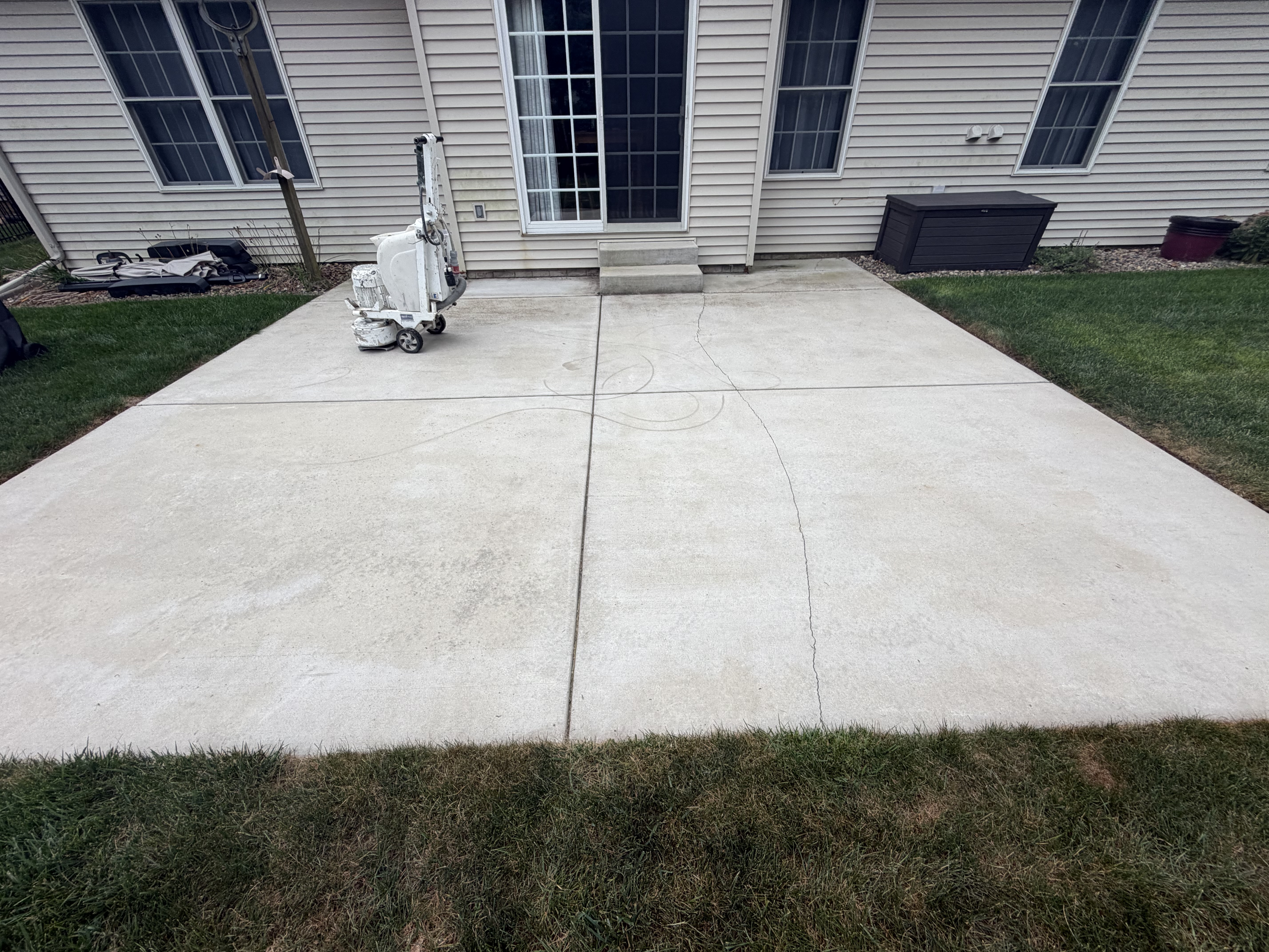 Dennis's Creekbed Garage and Front Patio with Shoreline (Beige) Back Patio Floor Coating - Before