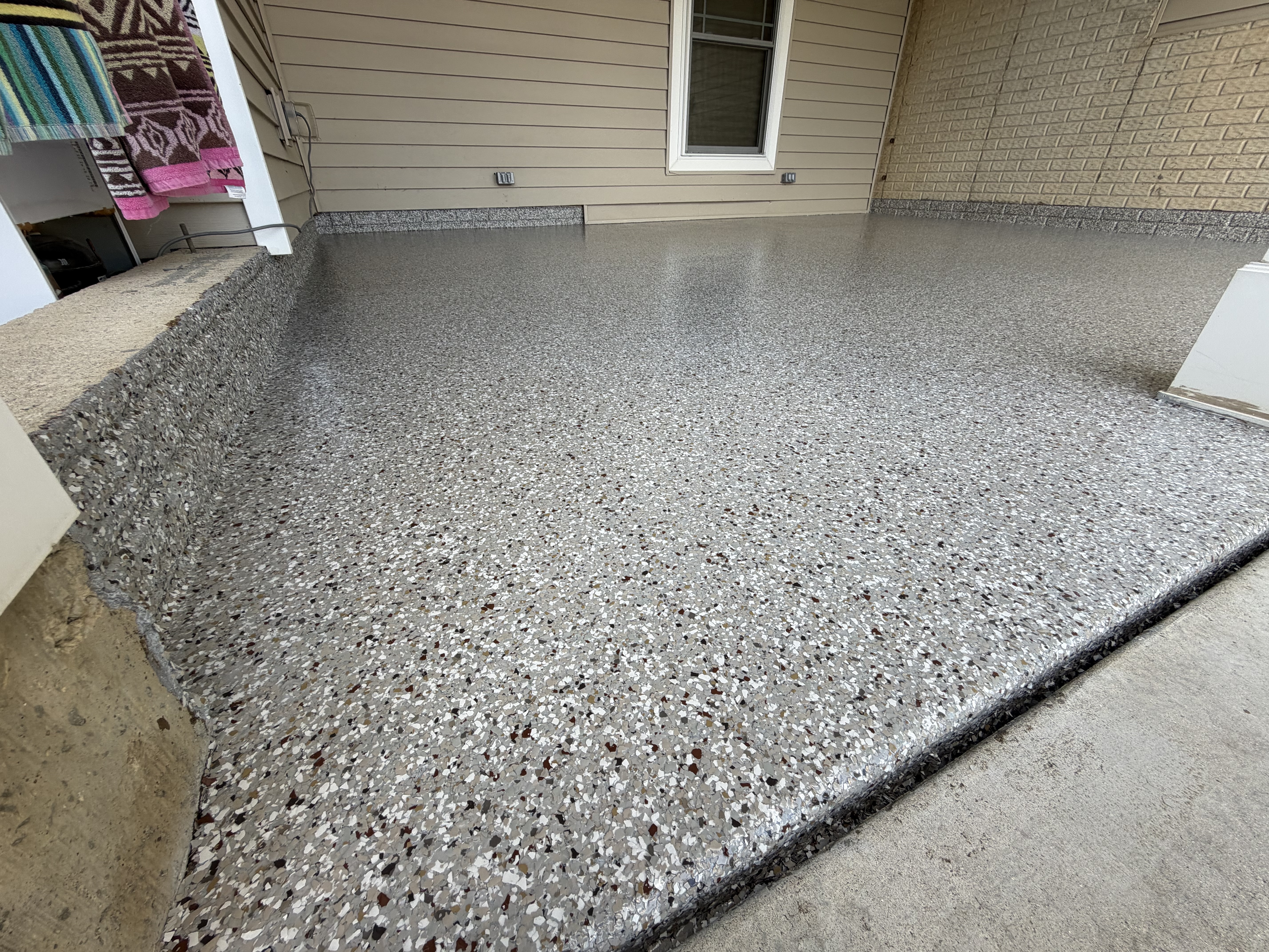 Lisa's newly coated patio, ready for years of enjoyment