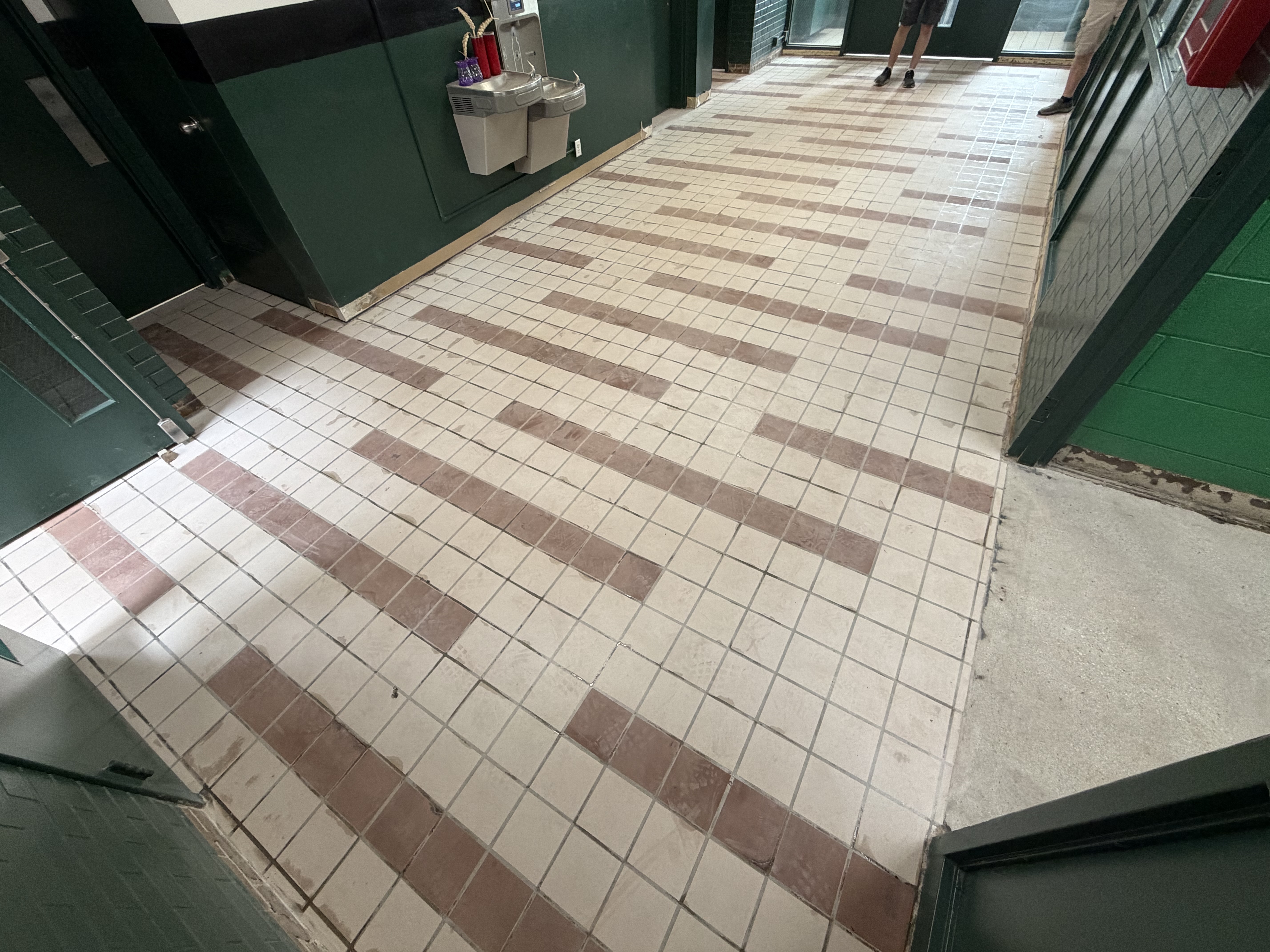 Prepping the church floor for coating