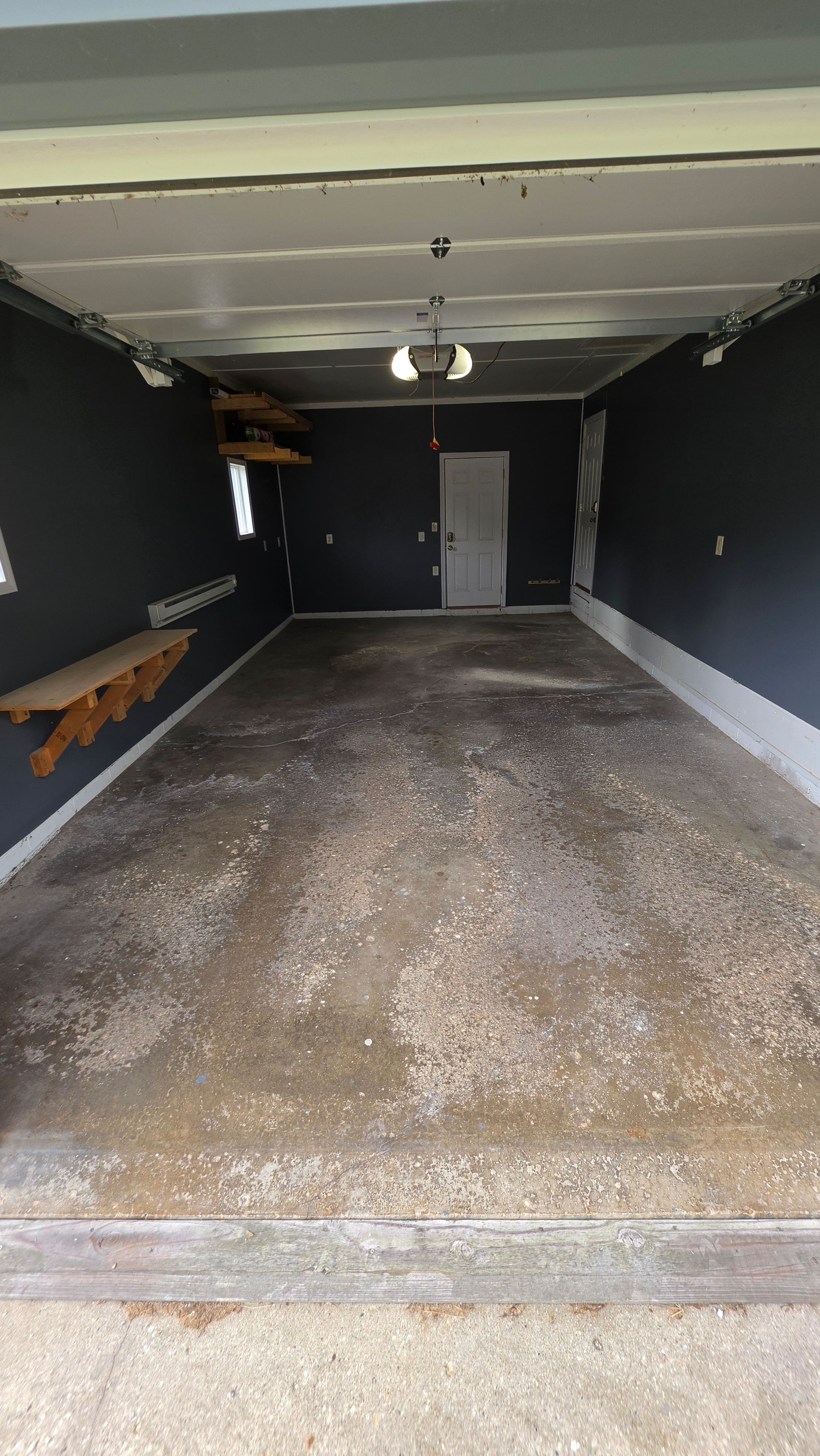 Curtis's Wombat Garage Floor Coating - Before
