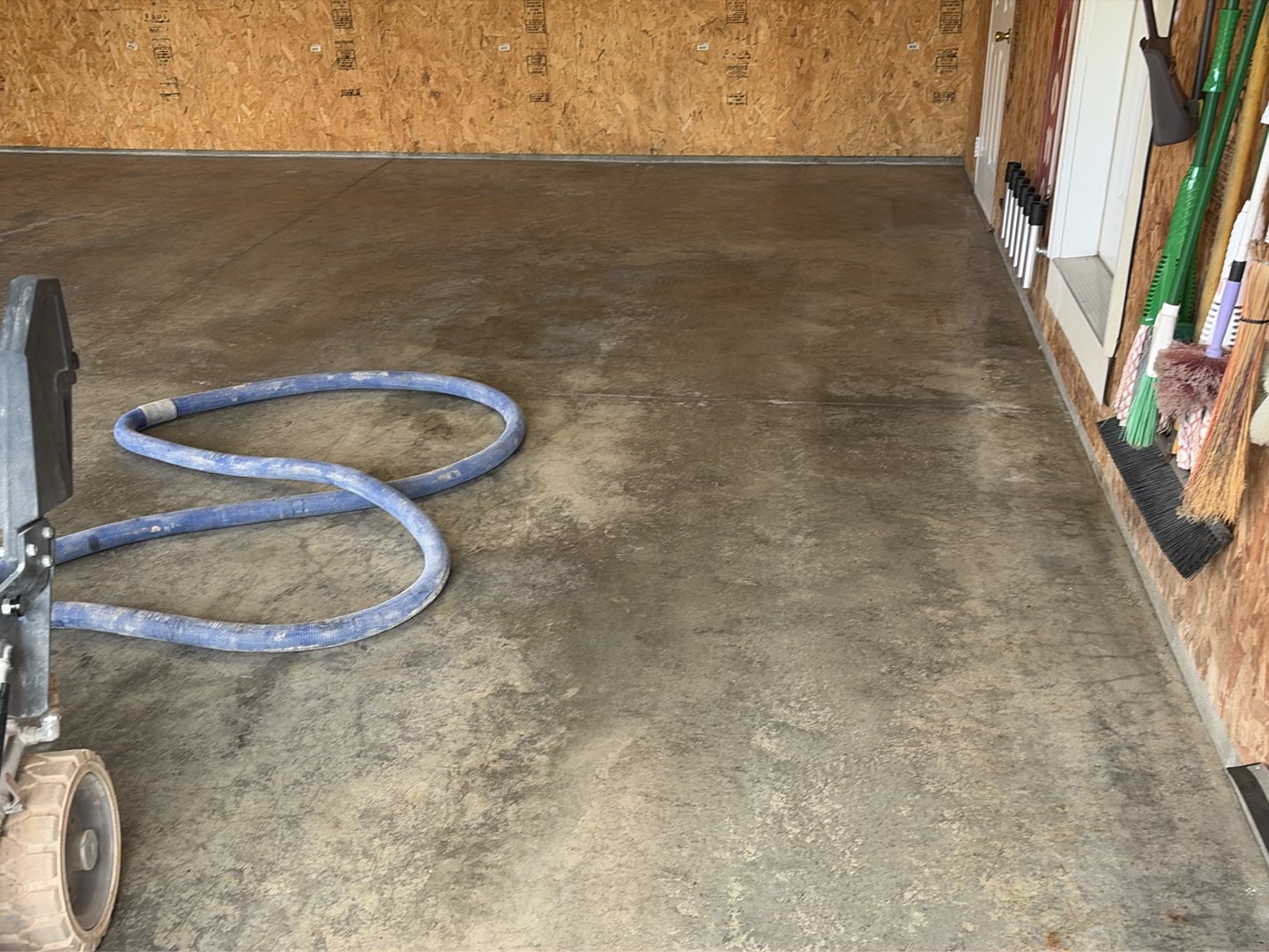 Jay's Shoreline Garage Floor Coating - Before