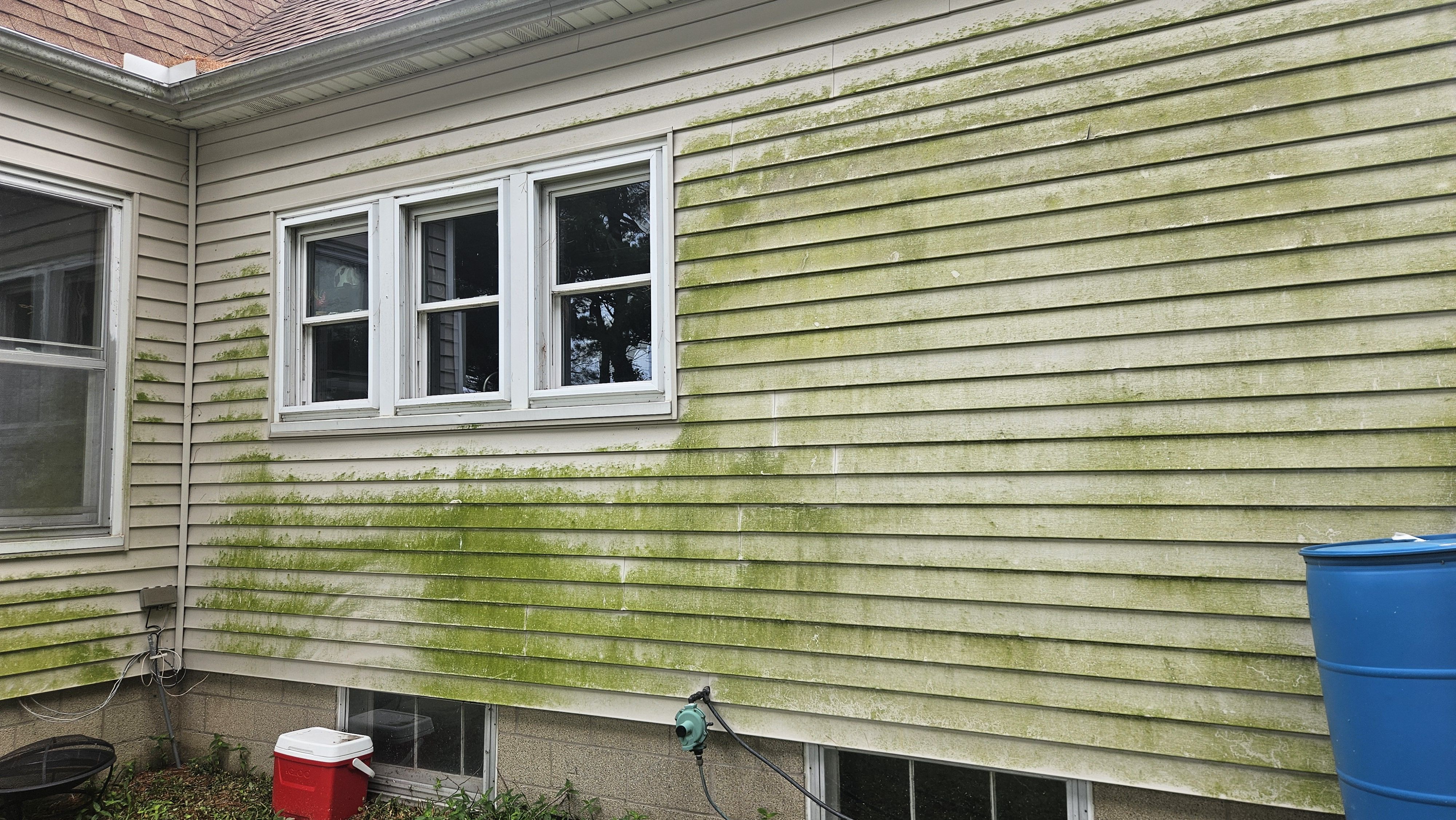 Close-up of the exterior surface pre-inspection, highlighting the grime.