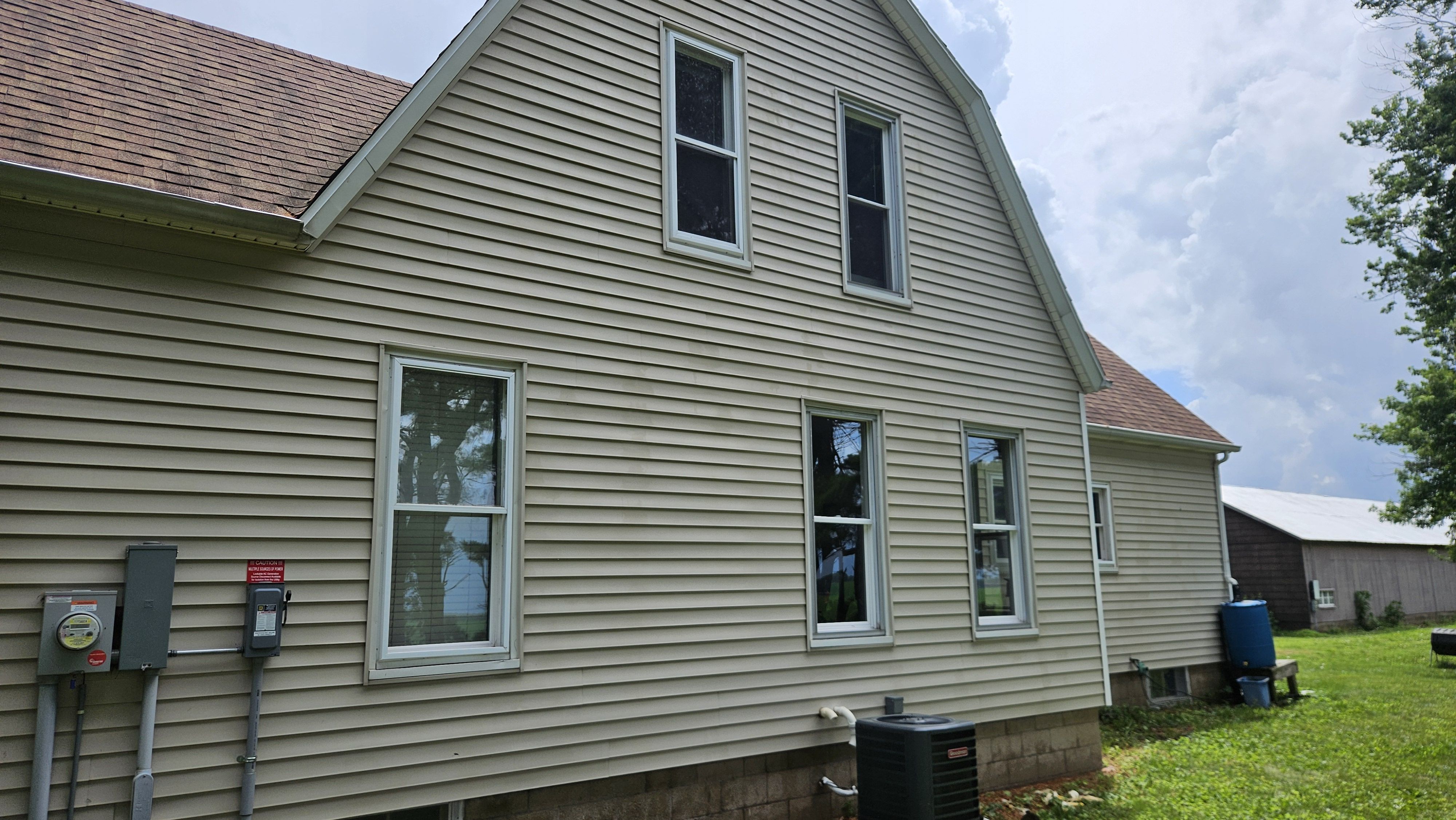A bright and clean view of the home's exterior post-service in Heyworth.