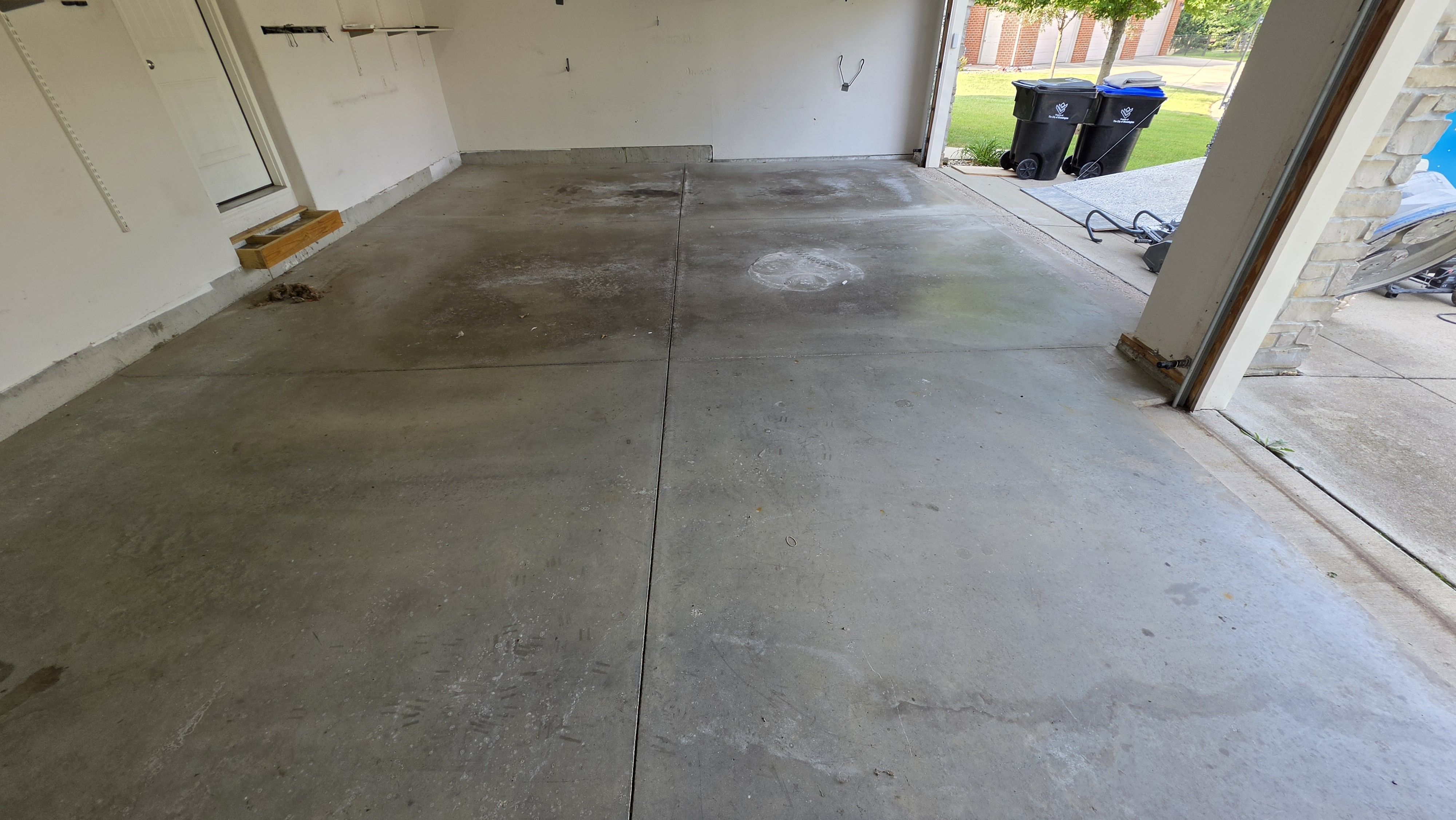 Chad's Tidal Wave Garage Floor Coating & Back Patio Coating - Before