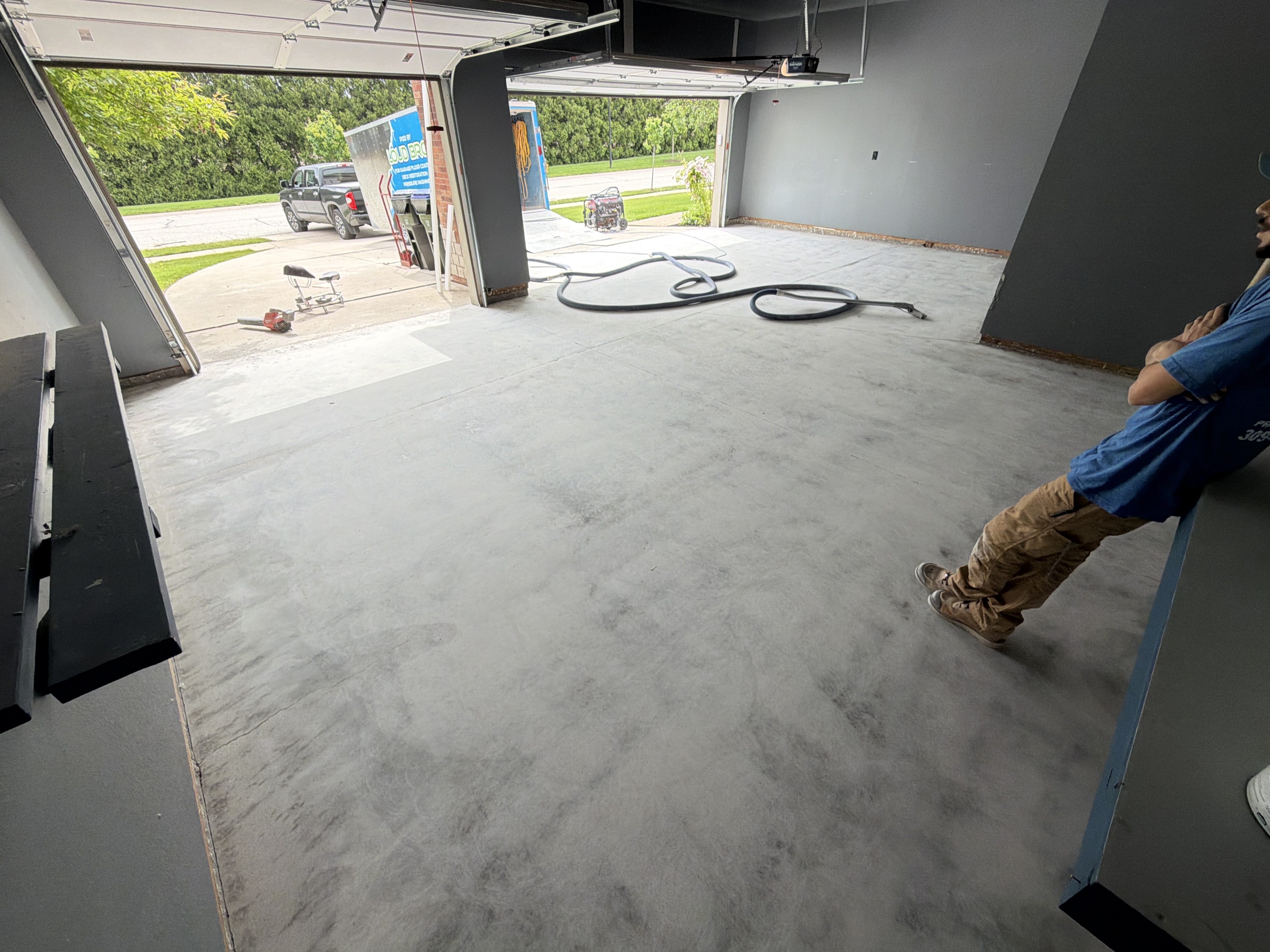 Loud Bros team meticulously grinding the concrete surface