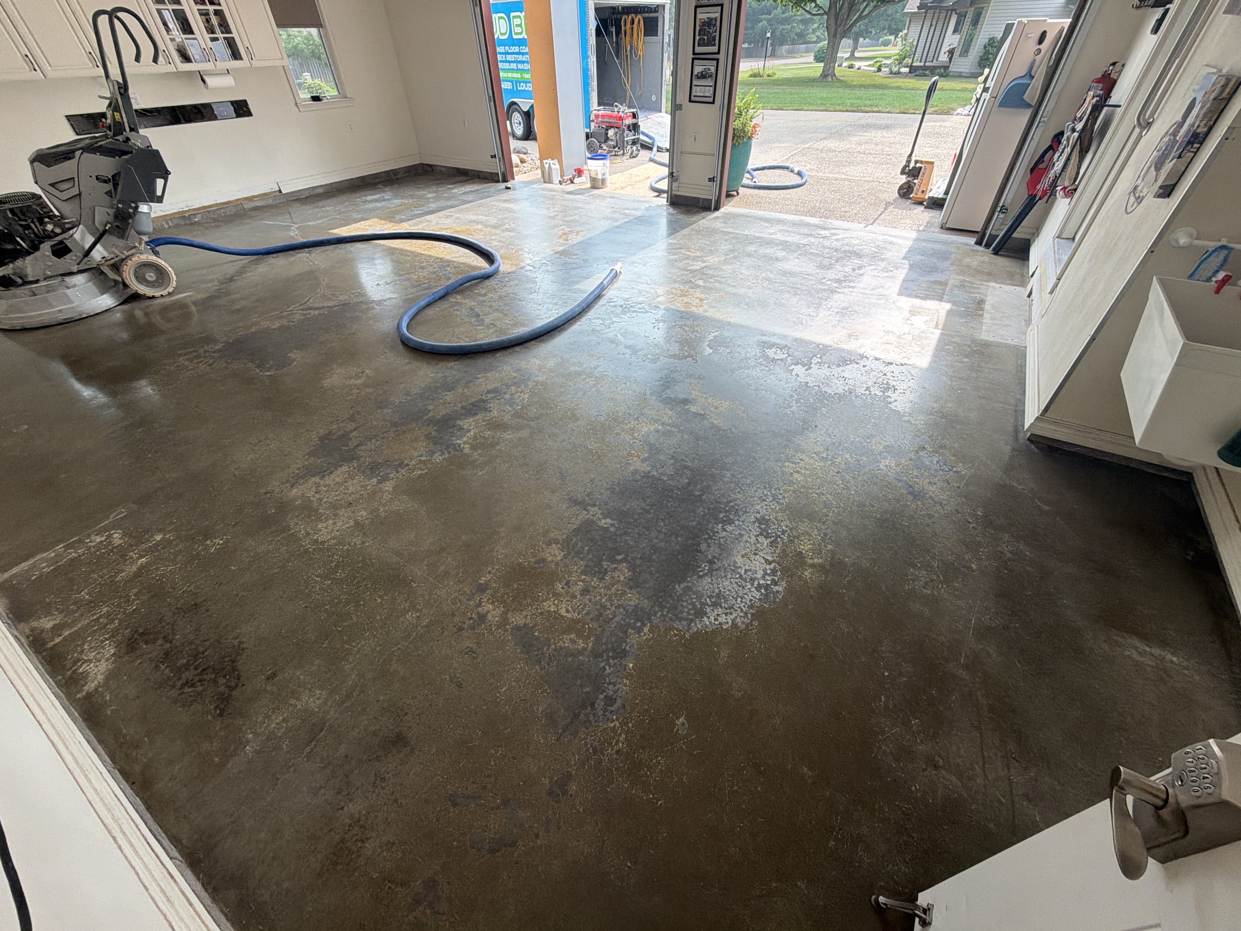 Another view of the worn and dusty concrete floor before coating